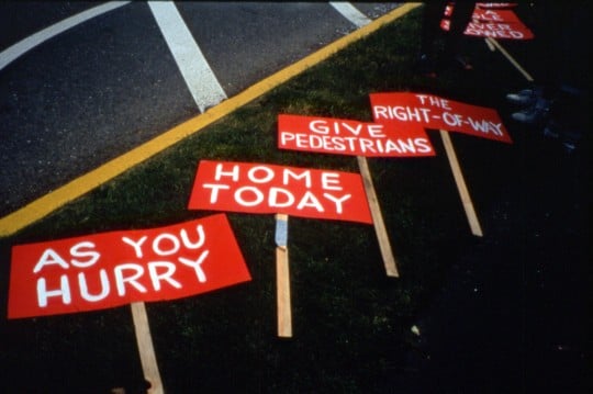 "Burma Shave" signs by Doug Klotz on the ground before the 5/14/02 Grant Park pedestrian action.