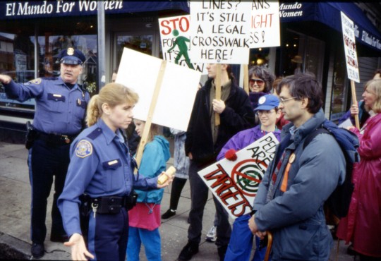 Earth Day, April 20, 1996 Officers stop to tell WPC to be careful crossing the street.