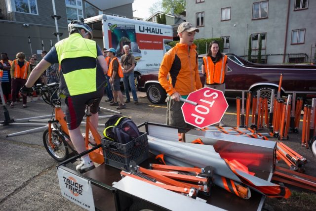 Using the Portland-made "Truck Trike" (built by Stites Design) to haul supplies.