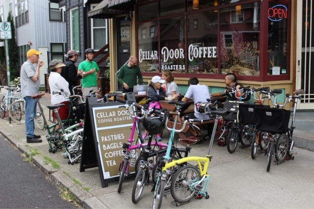 Riders take a break at a coffeeshop.(Photo: Brompton)