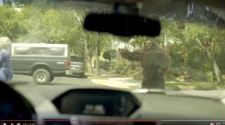 A sasquatch signals an intent to cross in the latest ODOT safety video.