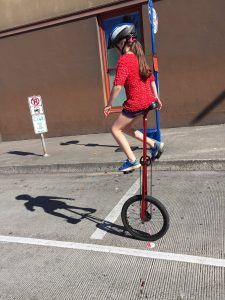 bridge-pedal-girl-on-unicycle