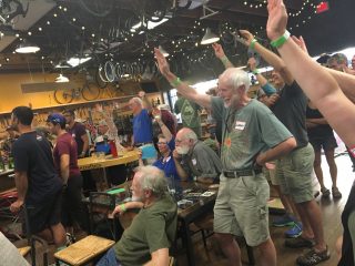 BTA members voting on the new name last night at Velo Cult in northeast Portland. (Photo: J. Maus/BikePortland)