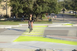 Solar "Dutch style" bikeways at an intersection on Texas A & M campus.(Photo: Texas A & M Transportation Institute)