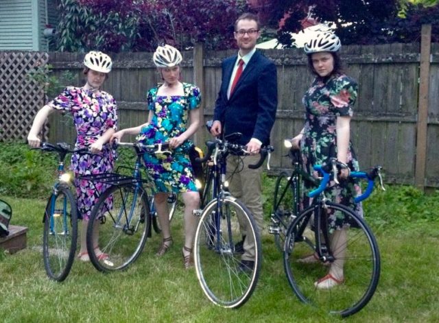 Three 80’s prom dress beauties and one handsome beast.