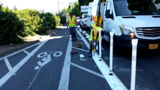 City crews installed a new plastic curb at SW 13th and Clay today.(Photos: City of Portland)