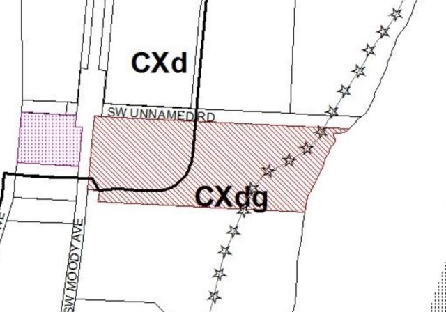 Land use application map showing "recreational trail" easement across Tesla parcel (in red).