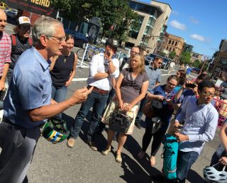 Hales spoke in the new public plaza on SW 3rd yesterday.(Photo: J. Maus/BikePortland)