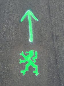 Follow the green lions.