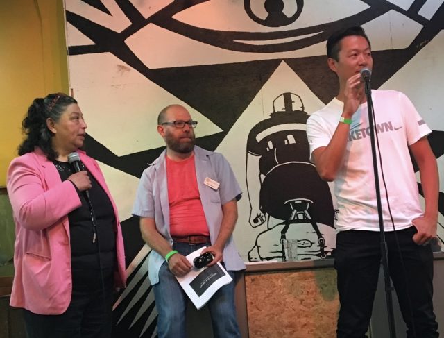 BTA Board President Justin Yuen (at the mic) with Executive Director Rob Sadowsky and a Spanish language interpreter (sorry I don't have her name yet).