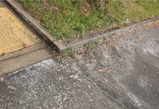 White paint currently litters the area after PBOT crews blasted the unsanctioned crosswalk off the pavement.