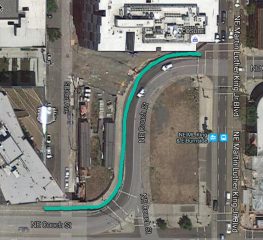 The curve. Note that the vacant lot on the right will soon be a new office building.