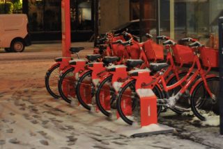 Biketown station on North Albina all tucked in and ready to go for tomorrow morning's commute.(Photo: J. Maus/BikePortland)