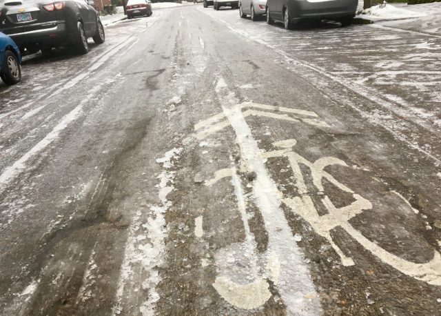 A cold sharrow on the North Michigan neighborhood greenway.