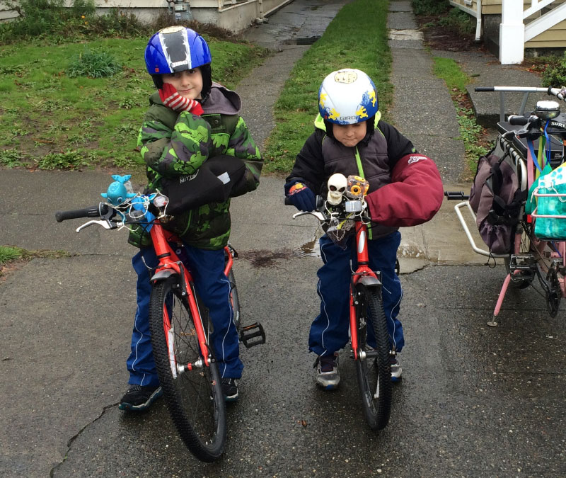 Handlebar mittens come as sets of two and work fine with shifters and brakes, though my kids like keeping their shifters visible.