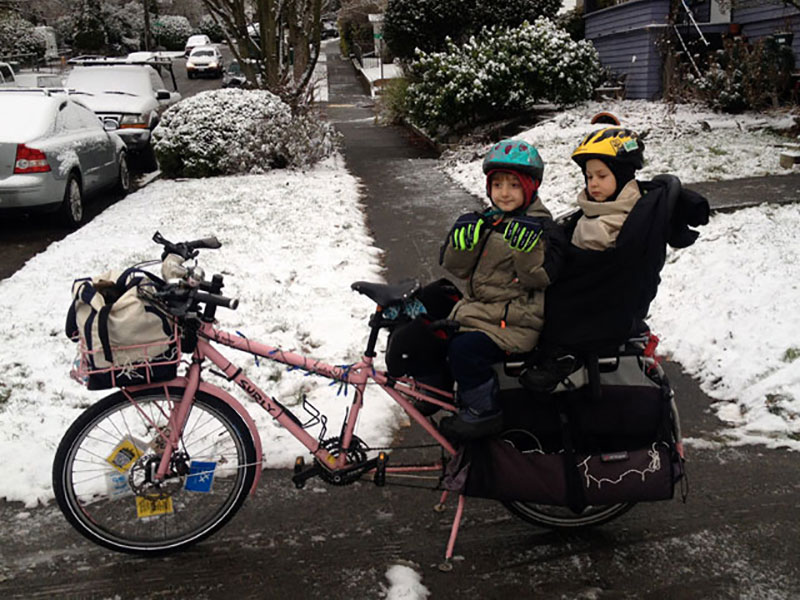Bundled-up bike passengers
