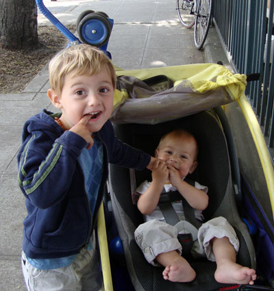 Baby in car seat in trailer