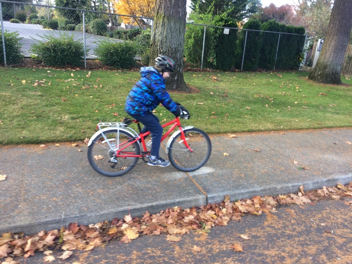 Riding bike on sidewalk on sale