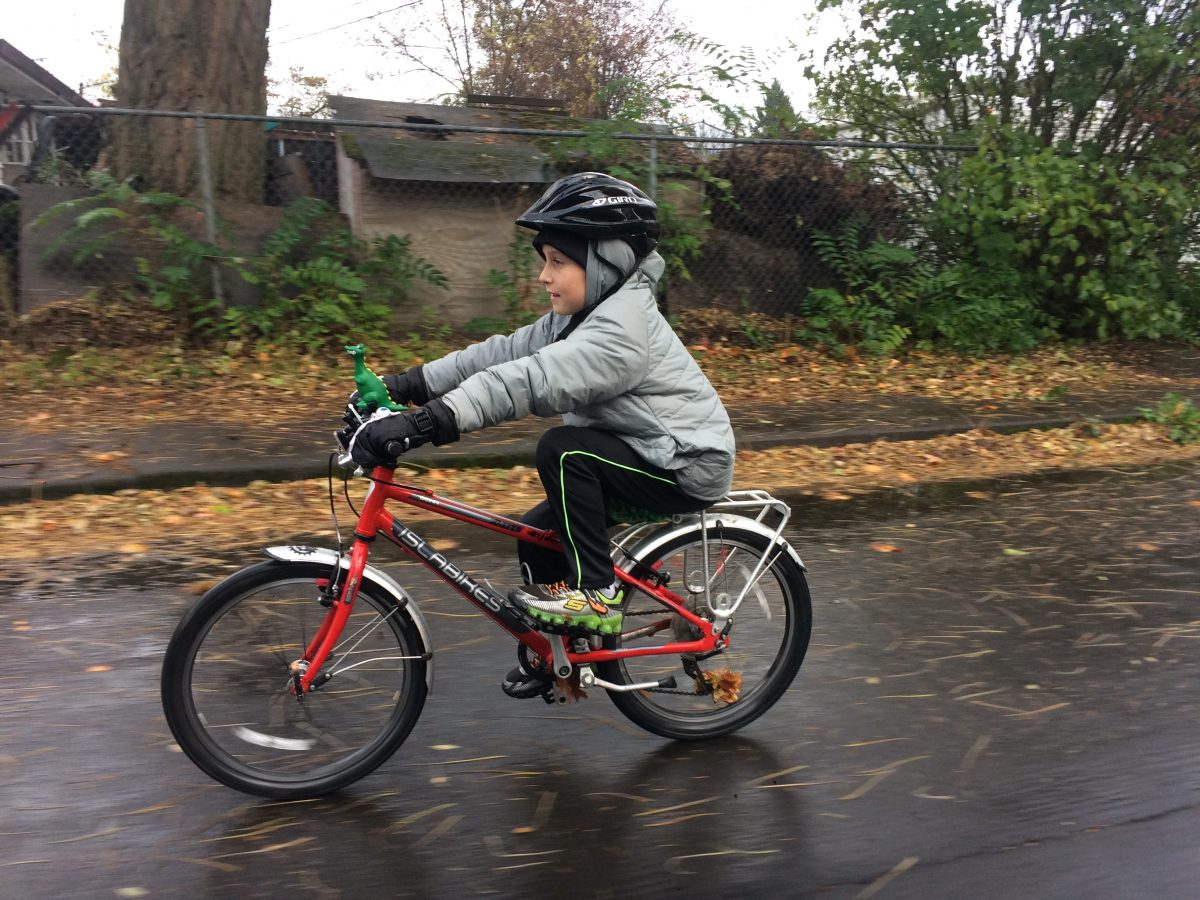 a kid riding a bike