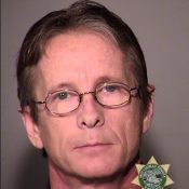 A man was arrested today for purposely driving his car into protestors downtown