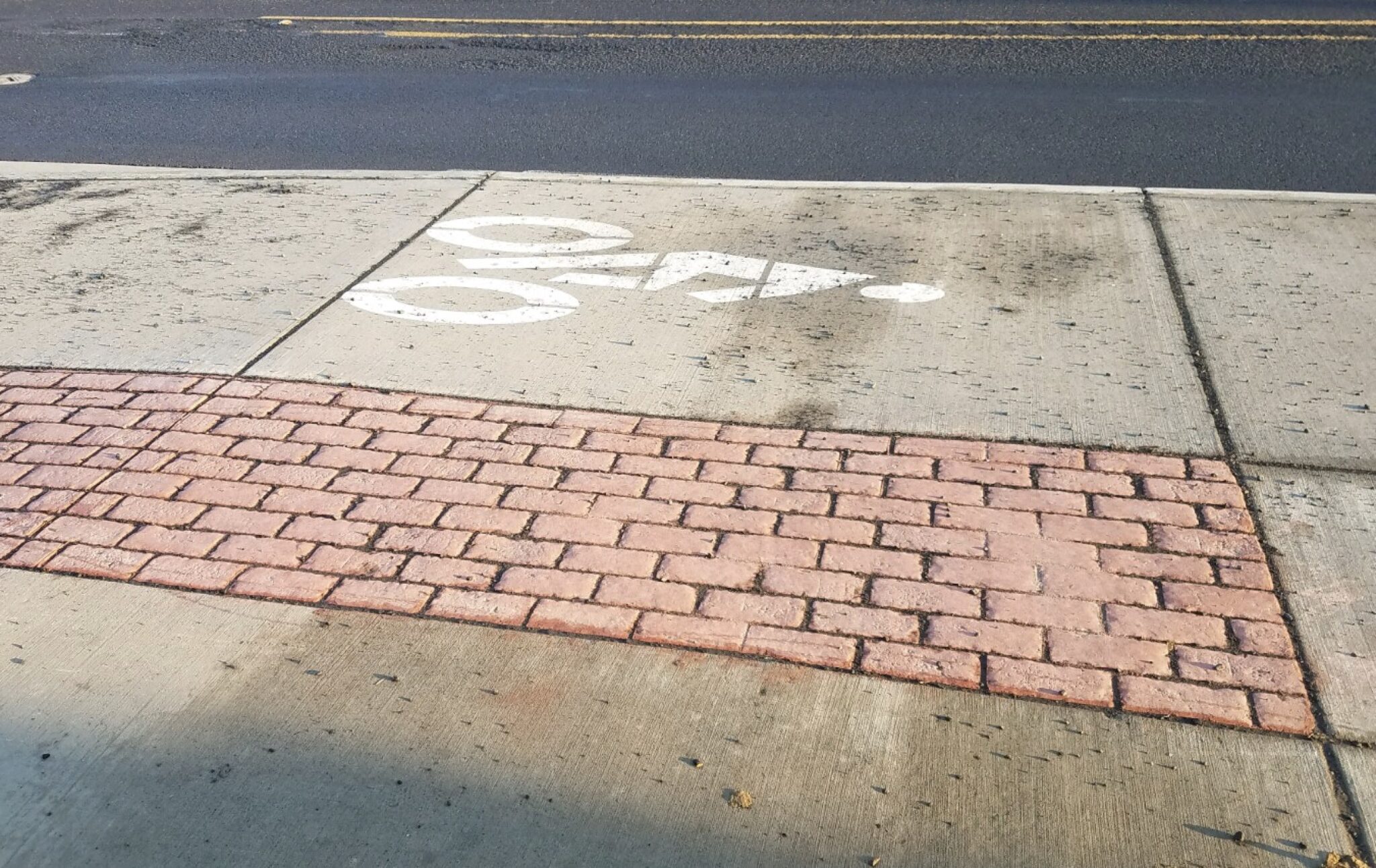 First look at raised bike lanes and sidewalks on outer SE Powell Blvd
