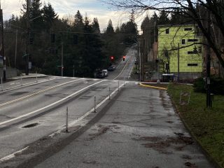 Looking south from SW Dosch Rd at Beaverton-Hillsdale Hwy. The curb extension blocks what was a right-turn lane. 