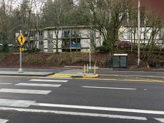 Pedestrian refuge island near SW 35th Ave. (Photo: Lisa Caballero/Bike Portland)