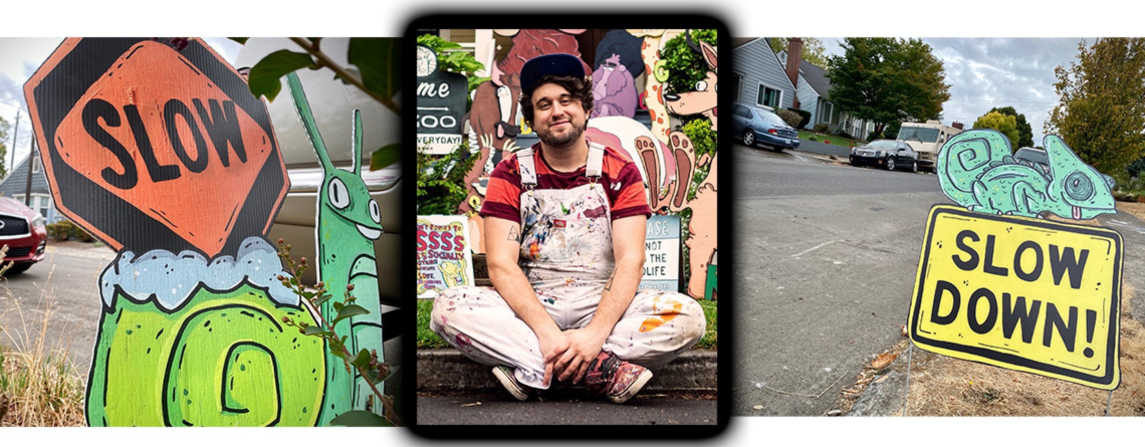 Artist Mike Bennett sitting with coveralls on and two of his street signs on either side of him.