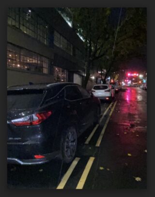 cars parked in bike lane on NW Flanders