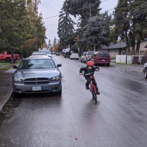 kid biking in the street