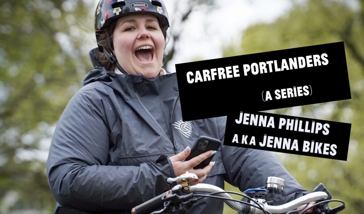 Woman smiling broadly while riding a bike.