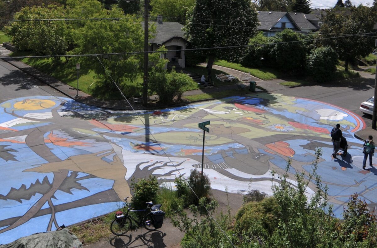 Aerial view of a large painting in an intersection.