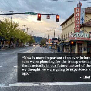 empty street in portland in a shopping district. text readds “Now is more important than ever before to make sure we're planning for the transportation system that's actually in our future instead of the future that we thought we were going to experience a decade ago.” - Eliot Rose, Metro