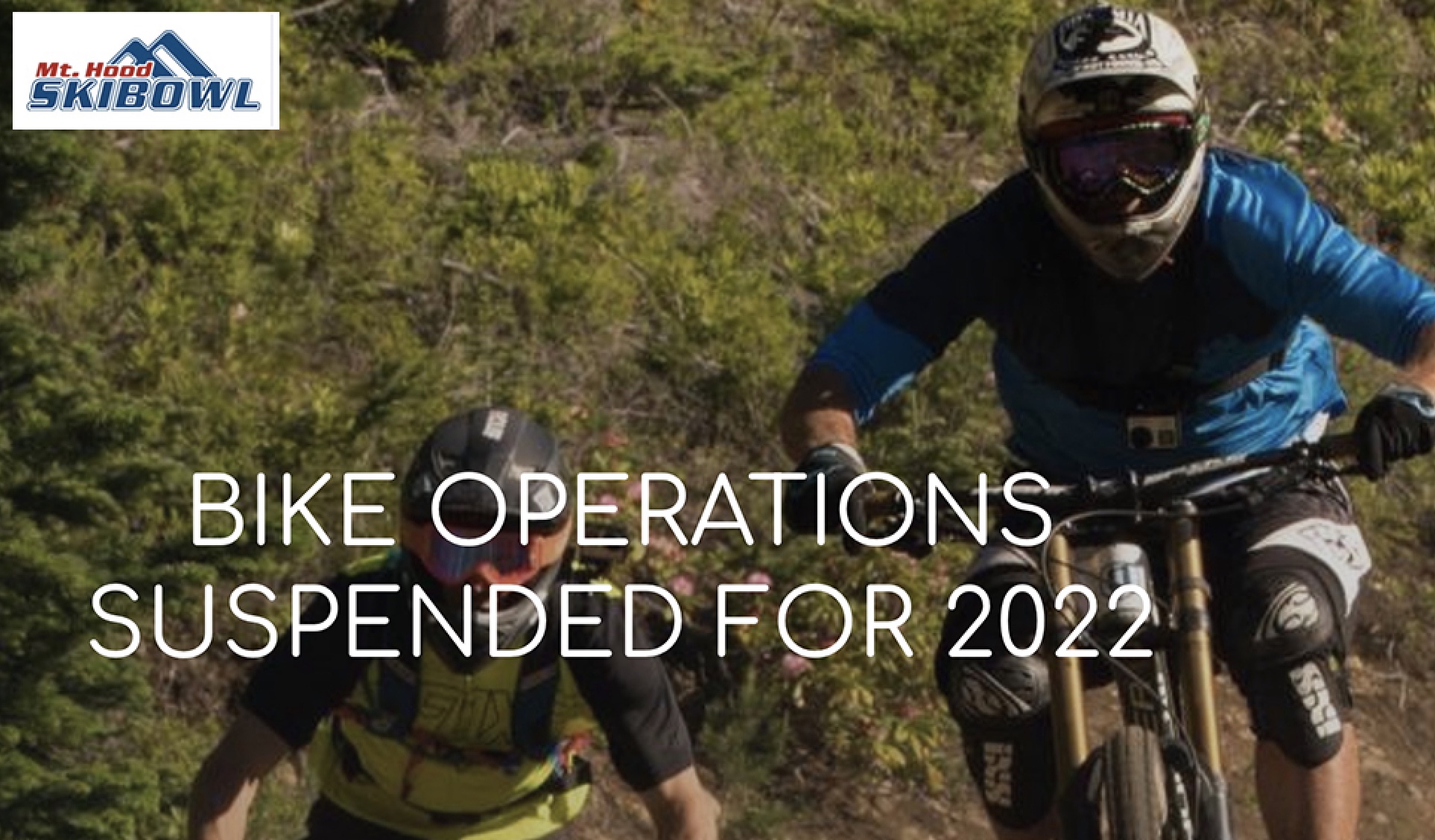Screen grab from Mt. Hood Skibowl site showing 2 MTB riders in protective gear and the words "Bike Operations Suspended for 2022"