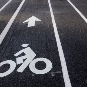 Buffered Bike Lane with a bike symbol and arrow pointing forward