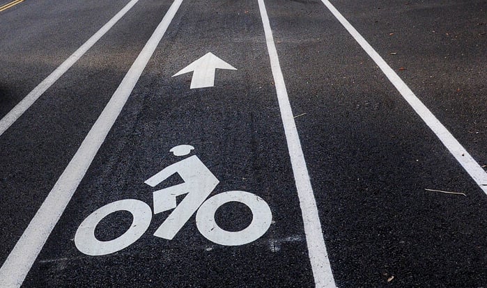 Buffered Bike Lane with a bike symbol and arrow pointing forward