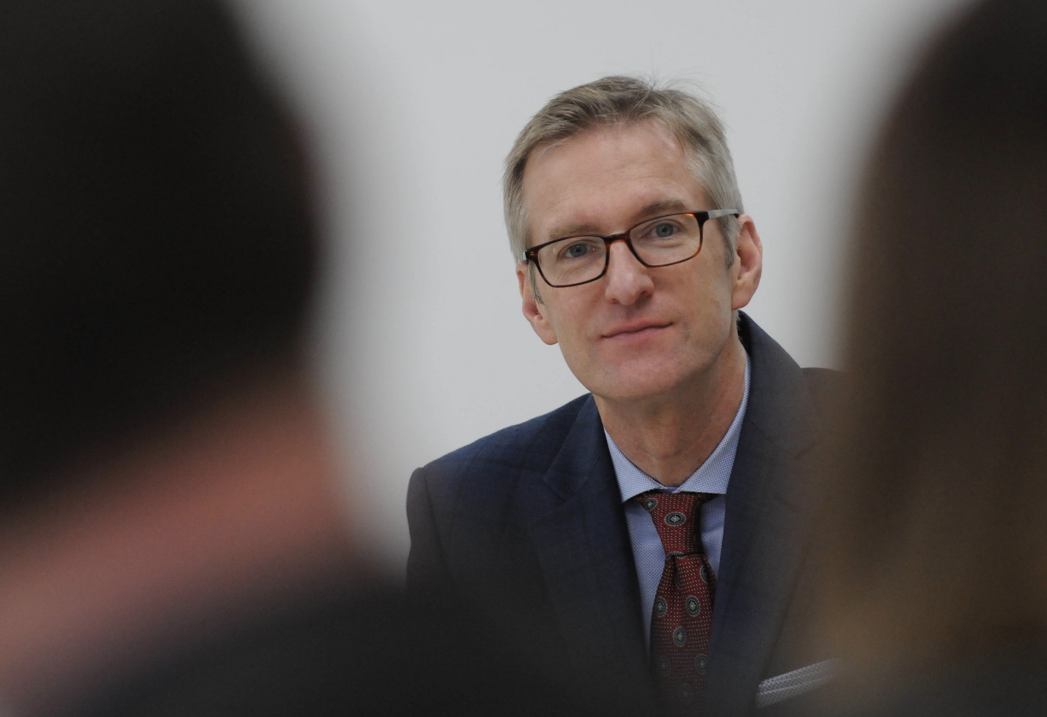 portland mayor ted wheeler looking into the camera at a meeting