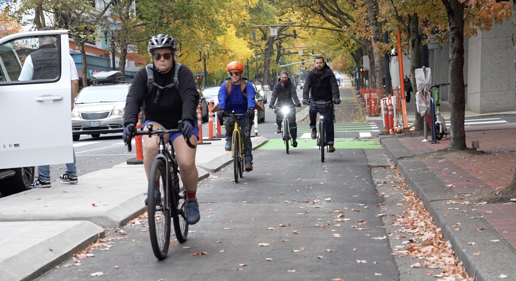New protected bike lane, bus lanes, now open on SW 4th Ave! – BikePortland